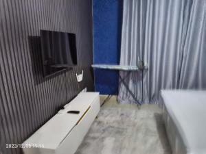 Televisyen dan/atau pusat hiburan di Kigemti Home