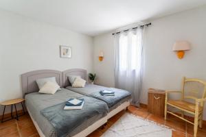 Postel nebo postele na pokoji v ubytování Le Mazet de Leon + 21 fotografií
