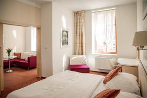 Posteľ alebo postele v izbe v ubytovaní Hotel Iberia