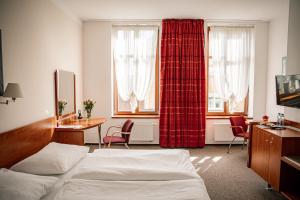 Posteľ alebo postele v izbe v ubytovaní Hotel Iberia