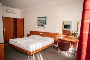 Posteľ alebo postele v izbe v ubytovaní Hotel Iberia