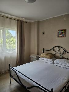 Un pat sau paturi într-o cameră la ElStefanino House