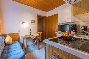 Kuchyňa alebo kuchynka v ubytovaní Apartment Rotbühlspitze