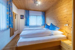 Posteľ alebo postele v izbe v ubytovaní Apartment Rotbühlspitze