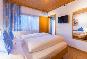Posteľ alebo postele v izbe v ubytovaní Apartment Rotbühlspitze