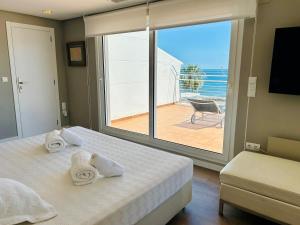 Ένα ή περισσότερα κρεβάτια σε δωμάτιο στο Javea Ocean View II +19 φωτογραφίες