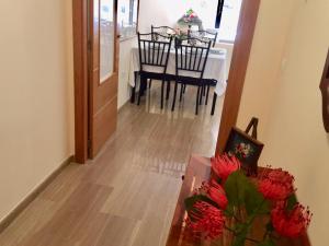 a dining room and kitchen with a table and chairs at Luxury spa living in Jávea