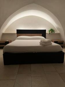 Letto o letti in una camera di Terra D`Itria