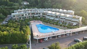 an aerial view of a hotel with a swimming pool at DiBa House 46 in San Vito Chietino