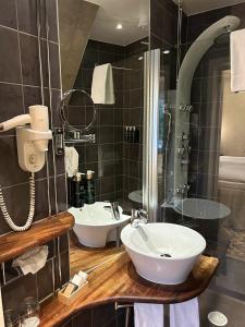 Koupelna v ubytování Sockerslottet Hotell
