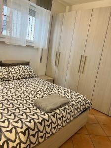 Postel nebo postele na pokoji v ubytování 85 mjka house free parking COMO