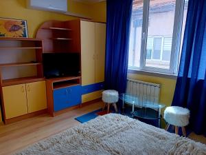 Et tv og/eller underholdning på Laura