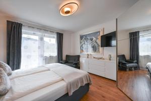 Ein Bett oder Betten in einem Zimmer der Unterkunft Ferienwohnung Herzstück im Haus Schlossblick