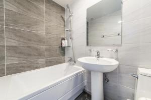 Koupelna v ubytování SL Hotel + 23 fotografií