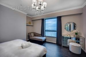 Postel nebo postele na pokoji v ubytování Jumeirah Beach Residence, Dubai Marina