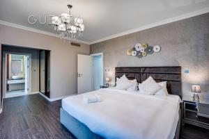 Postel nebo postele na pokoji v ubytování Jumeirah Beach Residence, Dubai Marina