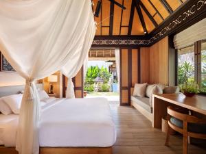 Postel nebo postele na pokoji v ubytování Novotel Bali Benoa