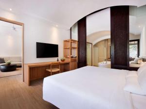 Postel nebo postele na pokoji v ubytování Novotel Bali Benoa