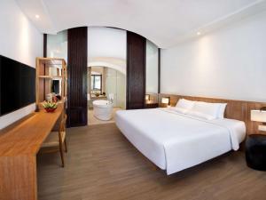 Postel nebo postele na pokoji v ubytování Novotel Bali Benoa