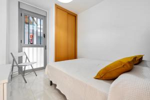 Postel nebo postele na pokoji v ubytování Hauzify I Apartament Mestral