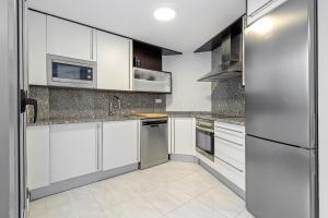 Kuchyň nebo kuchyňský kout v ubytování Hauzify I Apartament Mestral