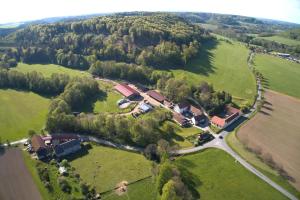 an aerial view of a house in a field at Maringotka Ivetka in Luže