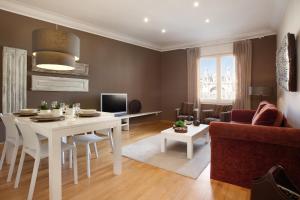 TV a/nebo společenská místnost v ubytování Enjoybcn Coliseum Apartments