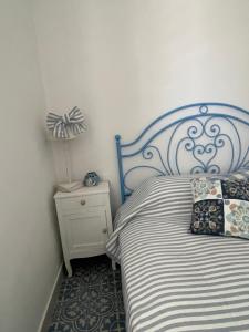 Ένα ή περισσότερα κρεβάτια σε δωμάτιο στο Casa Pagica