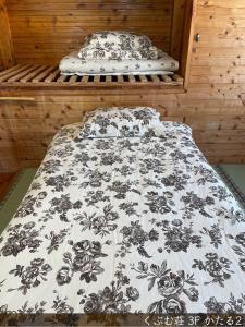 Ένα ή περισσότερα κρεβάτια σε δωμάτιο στο Kubumuso - Vacation STAY 14490v +3 φωτογραφίες