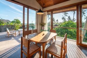 Balkón nebo terasa v ubytování MASMARA Resort Canggu