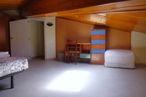 Posteľ alebo postele v izbe v ubytovaní apartament dúplex "Alsina"