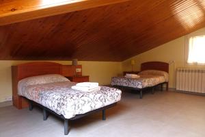 Posteľ alebo postele v izbe v ubytovaní apartament dúplex "Alsina"