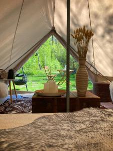Postel nebo postele na pokoji v ubytování Glamping Grindhuset