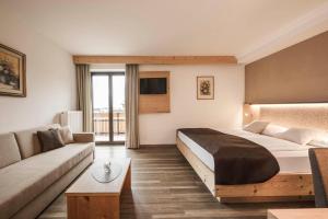 Postel nebo postele na pokoji v ubytování Hotel Karin