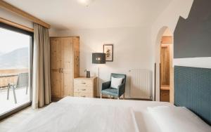 Postel nebo postele na pokoji v ubytování Hotel Karin