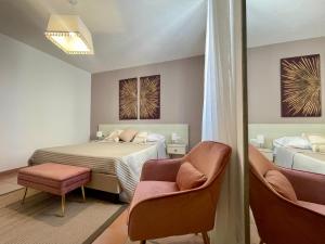 Ένα ή περισσότερα κρεβάτια σε δωμάτιο στο Antea Rooms