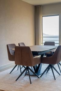 Posezení v ubytování Agosta: Terrace with sea view - Luxury flat | By Airnest