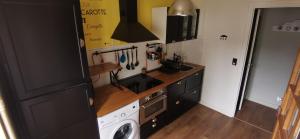 Kuchyň nebo kuchyňský kout v ubytování Appartement Duplex 4-5 pers En plein centre, classé 2 étoiles