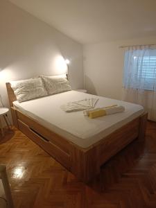 Postel nebo postele na pokoji v ubytování Rooms & Apartments Linda & Mario