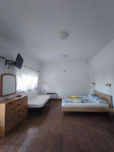 Postel nebo postele na pokoji v ubytování Rooms & Apartments Linda & Mario + 37 fotografií