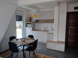 Кухня або міні-кухня у Apartman BUBAMARA