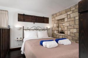 Posteľ alebo postele v izbe v ubytovaní Orelia Cretan Deluxe Apartments