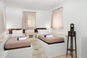 Posteľ alebo postele v izbe v ubytovaní Orelia Cretan Deluxe Apartments