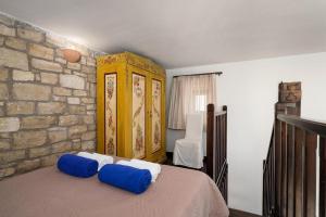 Posteľ alebo postele v izbe v ubytovaní Orelia Cretan Deluxe Apartments