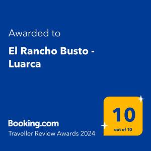 a yellow sign with the text awarded to el rancho bistro in l at El Rancho Busto - Luarca in Busto