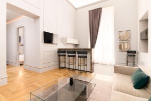 Televízia a/alebo spoločenská miestnosť v ubytovaní limehome Lecce Palazzo BN
