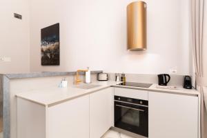 Kuchyňa alebo kuchynka v ubytovaní limehome Lecce Palazzo BN