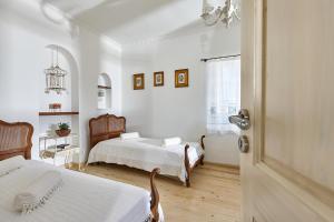 Posteľ alebo postele v izbe v ubytovaní Orelia Cretan Deluxe Apartments