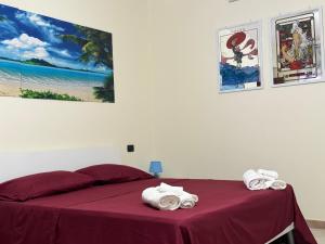 Ένα ή περισσότερα κρεβάτια σε δωμάτιο στο BEB Satriani Room