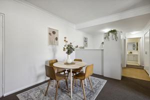 a dining room with a table and chairs at Northbridge Hideaway 2BDR 1BTH in Perth
